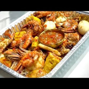 Seafood Ofada with Crabs, fish, small prawns